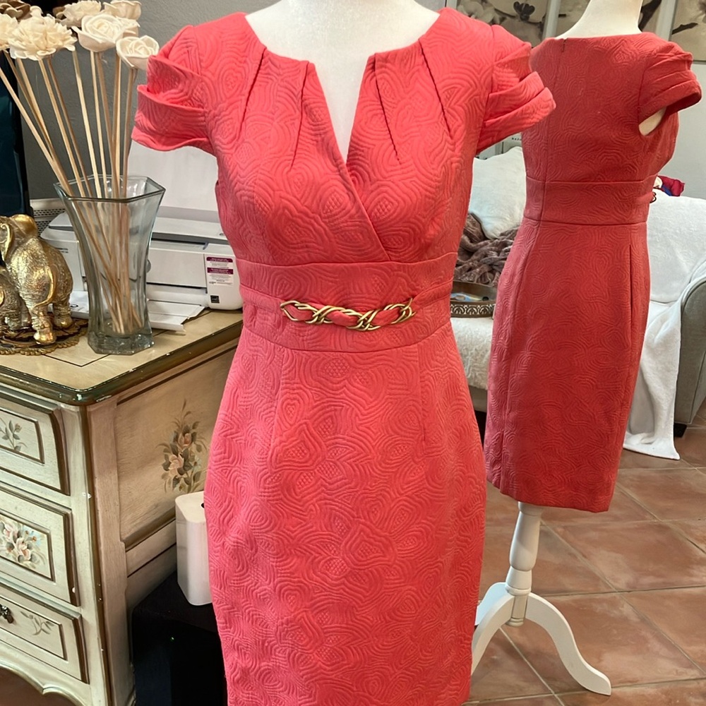 Elegant Coral Dress with Gold Chain Detail